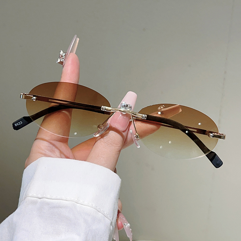 Rimless Oval Sunglasses Women  - огляд і ціна Vintage Fashion Brands